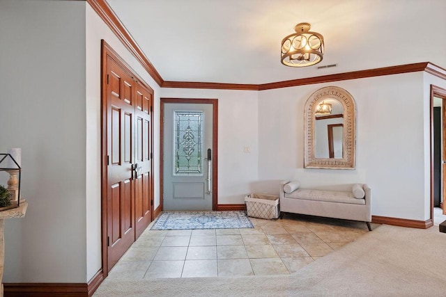 900 Hawks Holw, Delafield, WI 53018 - entryway with a chandelier, ornamental molding, and light tile patterned floors