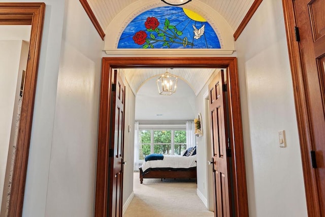900 Hawks Holw, Delafield, WI 53018 - corridor with a chandelier, vaulted ceiling, carpet floors, and crown molding