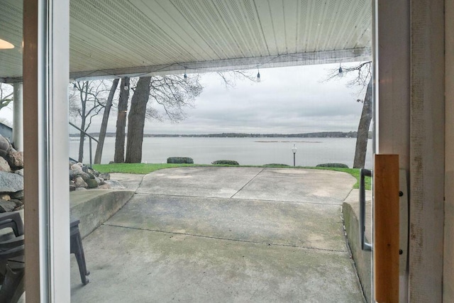 900 Hawks Holw, Delafield, WI 53018 - view of patio with a water view