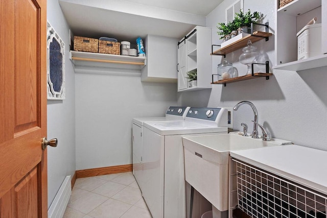 900 Hawks Holw, Delafield, WI 53018 - laundry area featuring washing machine and clothes dryer and light tile patterned floors