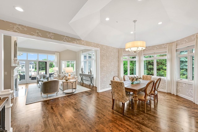 17185 Lake Rd Unit C, Brookfield, WI 53005 - dining room featuring wallpapered walls, wood finished floors, lofted ceiling, recessed lighting, and a fireplace