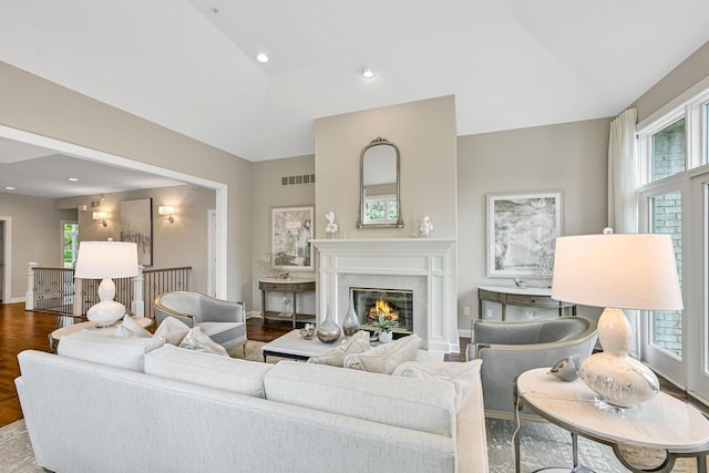 17185 Lake Rd Unit C, Brookfield, WI 53005 - living room with a fireplace, dark wood-style floors, and lofted ceiling