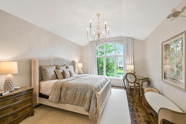 17185 Lake Rd Unit C, Brookfield, WI 53005 - bedroom with lofted ceiling, a chandelier, and wood finished floors