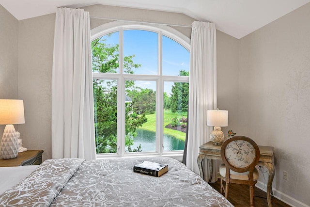 17185 Lake Rd Unit C, Brookfield, WI 53005 - bedroom with multiple windows, vaulted ceiling, and wood finished floors