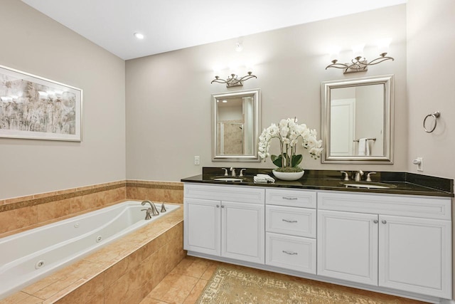 17185 Lake Rd Unit C, Brookfield, WI 53005 - full bath with double vanity, a tub with jets, and tile patterned flooring