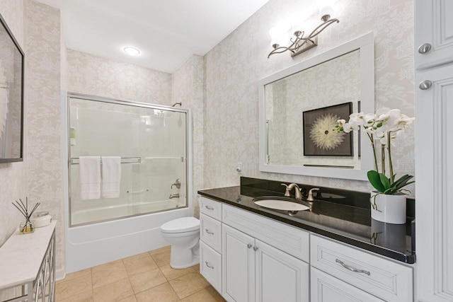 17185 Lake Rd Unit C, Brookfield, WI 53005 - full bathroom with wallpapered walls, vanity, shower / bath combination with glass door, and tile patterned floors
