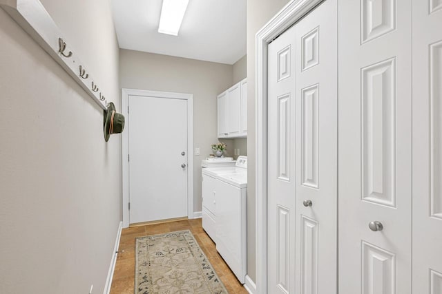 17185 Lake Rd Unit C, Brookfield, WI 53005 - washroom with cabinet space and washer and dryer