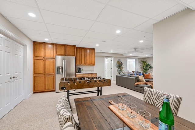 17185 Lake Rd Unit C, Brookfield, WI 53005 - dining space with light colored carpet, a ceiling fan, a paneled ceiling, and recessed lighting