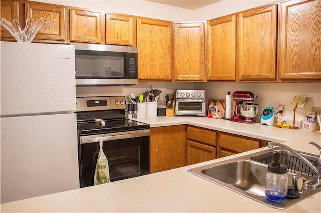 3155 Craig Rd Unit 3155, Eau Claire, WI 54701 - kitchen featuring appliances with stainless steel finishes and light countertops