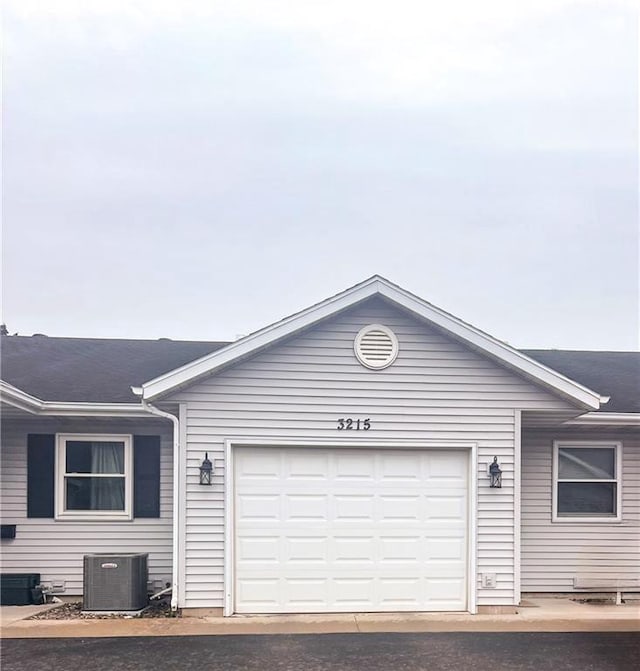 3215 Craig Rd Unit 3215, Eau Claire, WI 54701 - view of front facade with a shingled roof