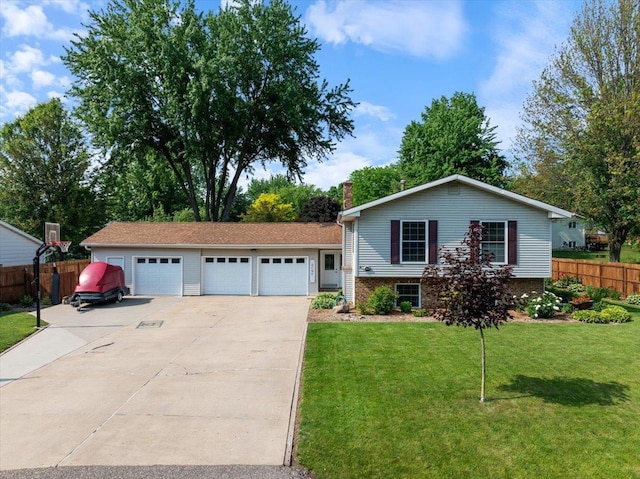 1125 W State St, Marshfield, WI 54449 - tri-level home with a chimney and brick siding