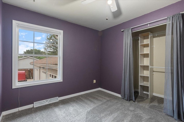 1125 W State St, Marshfield, WI 54449 - unfurnished bedroom with carpet floors and ceiling fan