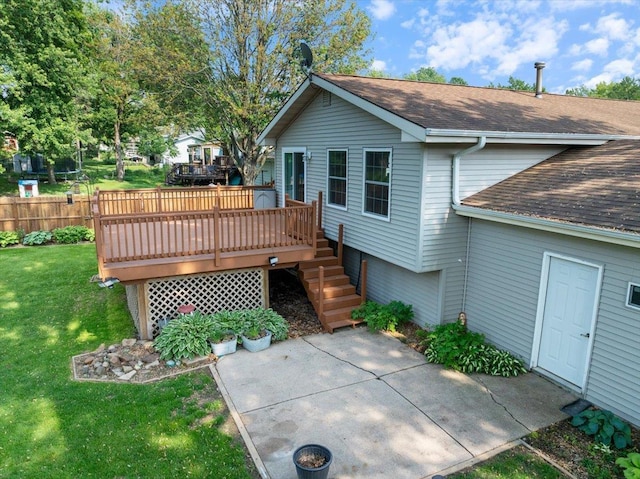 1125 W State St, Marshfield, WI 54449 - back of property with roof with shingles, a deck, a patio, and stairs