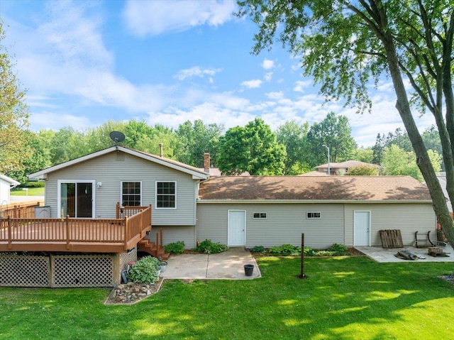1125 W State St, Marshfield, WI 54449 - back of house with a patio, a deck, and a lawn