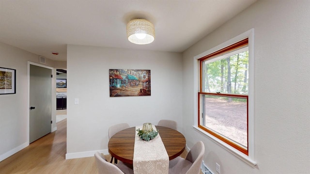 801 S Maryknoll Ave, Marshfield, WI 54449 - dining area featuring light wood-style floors and baseboards