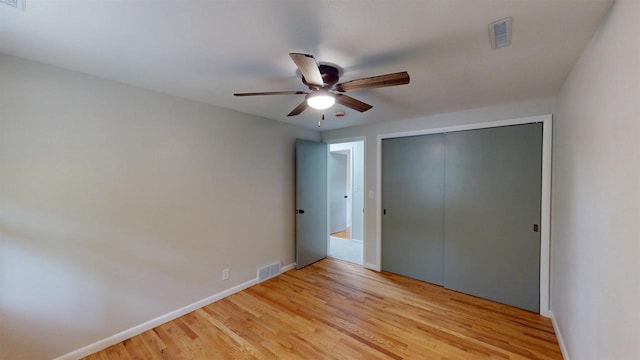 801 S Maryknoll Ave, Marshfield, WI 54449 - unfurnished bedroom with light wood-type flooring, a closet, and ceiling fan