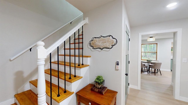801 S Maryknoll Ave, Marshfield, WI 54449 - stairs featuring wood finished floors and baseboards