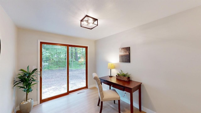 801 S Maryknoll Ave, Marshfield, WI 54449 - office area with baseboards and light wood-style flooring
