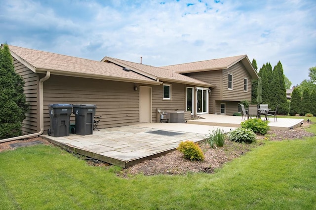 5947 Pilgrim Way, Mount Pleasant, WI 53406 - rear view of house with a lawn, a wooden deck, and roof with shingles