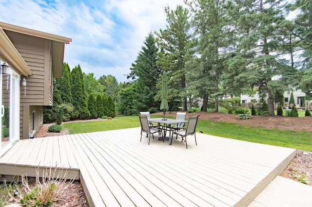 5947 Pilgrim Way, Mount Pleasant, WI 53406 - deck with outdoor dining space and a yard
