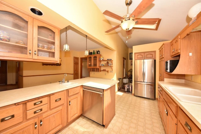3786 S 35th St, Greenfield, WI 53221 - kitchen with stainless steel appliances, a ceiling fan, light countertops, a peninsula, and glass insert cabinets