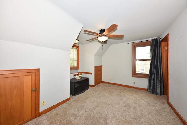 3786 S 35th St, Greenfield, WI 53221 - additional living space with vaulted ceiling, light colored carpet, and ceiling fan