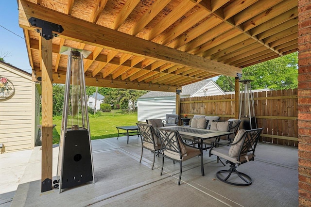 323 S 79th St, Milwaukee, WI 53214 - view of patio with outdoor dining area and a storage shed