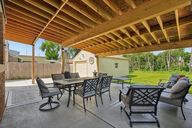 323 S 79th St, Milwaukee, WI 53214 - view of patio featuring outdoor dining area and an outbuilding