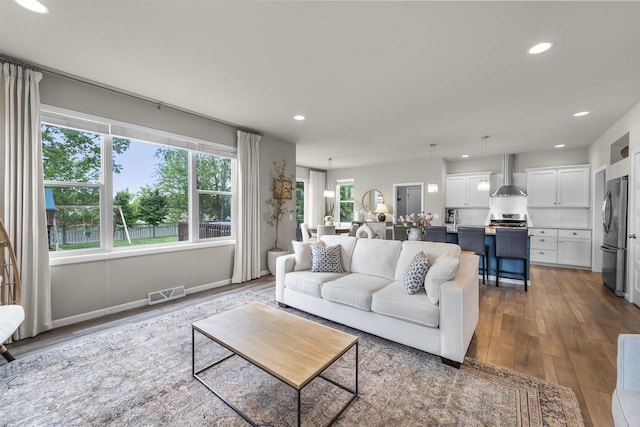 405 Blue Moon Dr, Verona, WI 53593 - living room featuring wood finished floors and recessed lighting