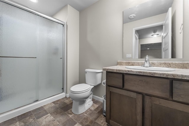 405 Blue Moon Dr, Verona, WI 53593 - bathroom featuring vanity, a stall shower, and stone finish flooring