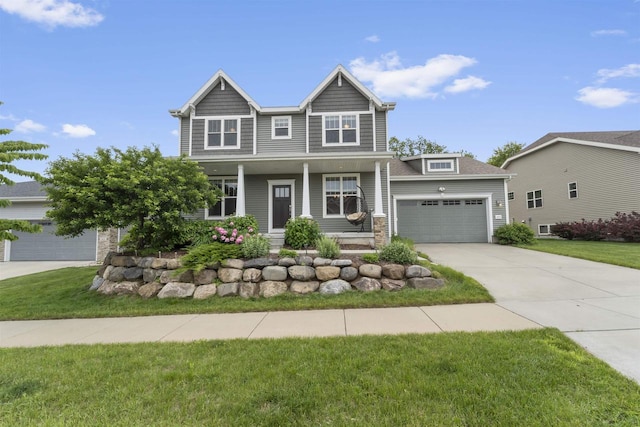 405 Blue Moon Dr, Verona, WI 53593 - craftsman-style house with concrete driveway, a porch, a garage, and a front yard
