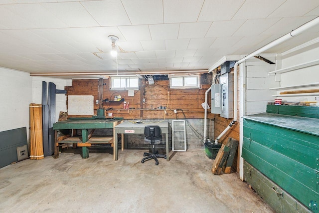 120 W 12th St, Ashland, WI 54806 - below grade area featuring a workshop area and wooden walls