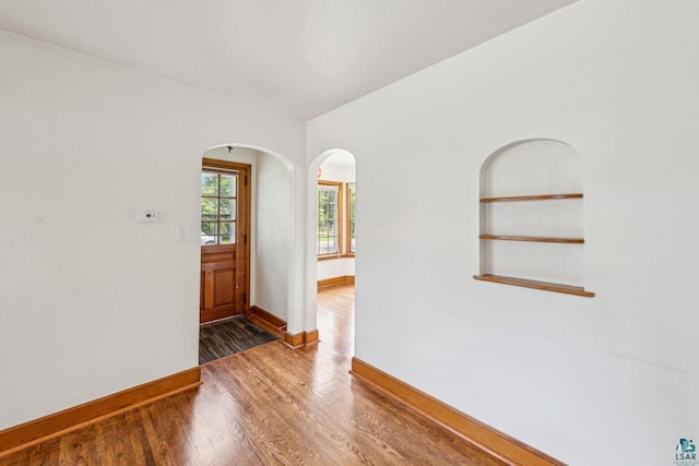 120 W 12th St, Ashland, WI 54806 - foyer entrance with arched walkways and wood finished floors