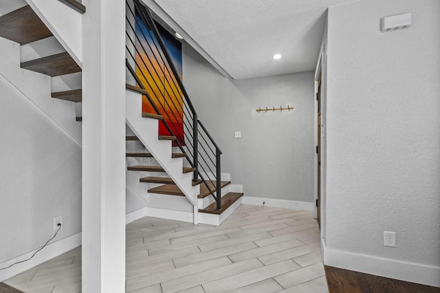 175 Old Wausau Rd, Stevens Point, WI 54481 - staircase with recessed lighting and wood finished floors