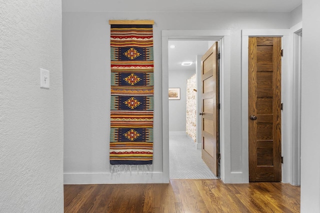 175 Old Wausau Rd, Stevens Point, WI 54481 - corridor featuring wood finished floors and baseboards