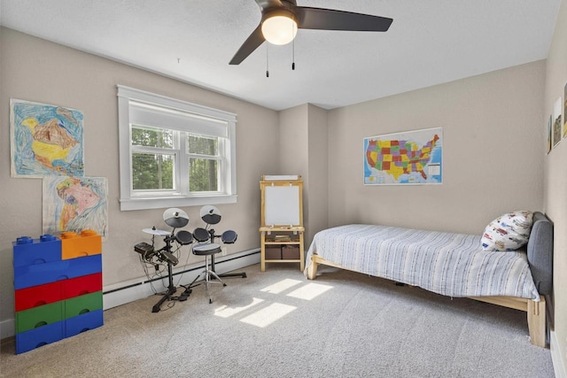 175 Old Wausau Rd, Stevens Point, WI 54481 - bedroom with carpet, baseboard heating, and a ceiling fan