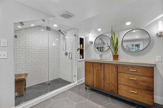 175 Old Wausau Rd, Stevens Point, WI 54481 - full bath featuring lofted ceiling, vanity, a stall shower, tile patterned flooring, and recessed lighting
