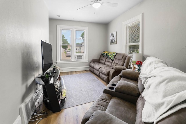 274 E 1st St, Fond Du Lac, WI 54935 - living area featuring wood finished floors and ceiling fan