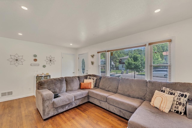 4951 N 49th St, Milwaukee, WI 53218 - living area featuring light wood-style flooring and recessed lighting