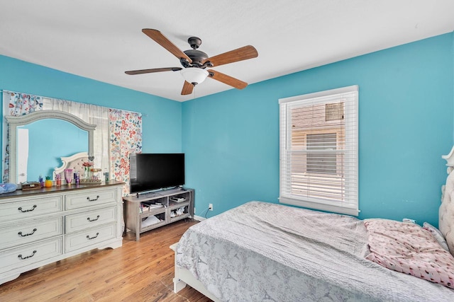 4951 N 49th St, Milwaukee, WI 53218 - bedroom with light wood-style floors and a ceiling fan