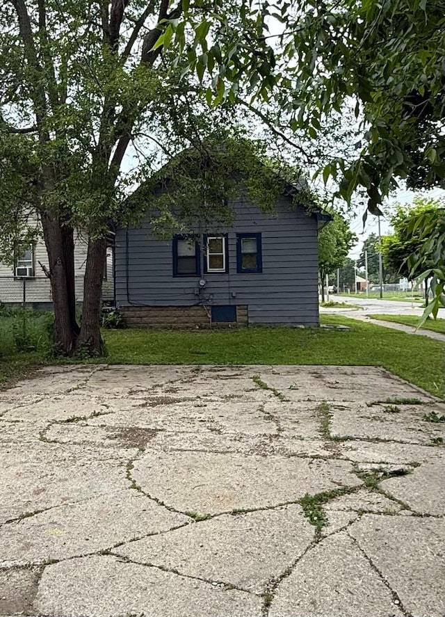 4668 N 29th St, Milwaukee, WI 53209 - view of home's exterior featuring a yard