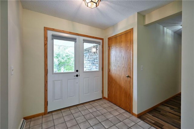 5342 W County Highway F, Trego, WI 54888 - entrance foyer with a textured ceiling and light tile patterned floors