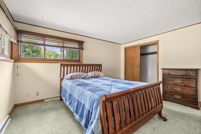 2908 Prais St, Stevens Point, WI 54481 - bedroom with carpet, a baseboard radiator, a closet, and ornamental molding