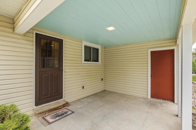 2908 Prais St, Stevens Point, WI 54481 - property entrance with a patio and an attached carport