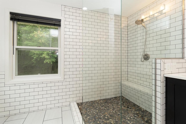 N2559 Pleasant View Ln, Waupaca, WI 54981 - full bath featuring a tile shower, vanity, and tile walls