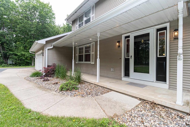 N2559 Pleasant View Ln, Waupaca, WI 54981 - property entrance with covered porch and a garage