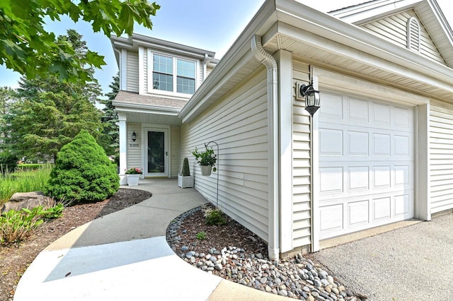 2147 E Broadway Unit A, Waukesha, WI 53186 - doorway to property featuring a garage
