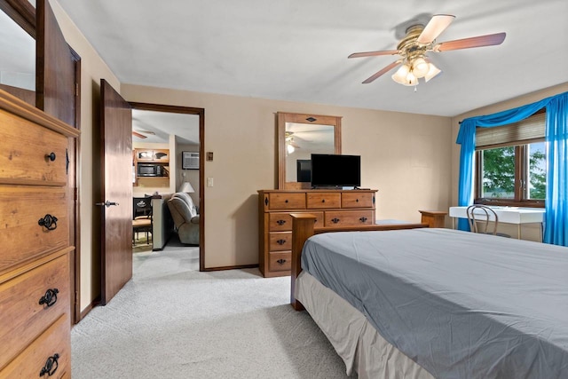 2409 Cedar Ridge Ct Unit D, Green Bay, WI 54313 - bedroom featuring light colored carpet and a ceiling fan