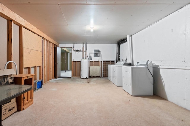 2409 Cedar Ridge Ct Unit D, Green Bay, WI 54313 - below grade area featuring washing machine and clothes dryer, light colored carpet, and a water softener