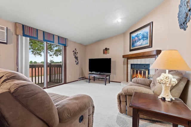 2409 Cedar Ridge Ct Unit D, Green Bay, WI 54313 - living area featuring light colored carpet, vaulted ceiling, a fireplace, and baseboard heating